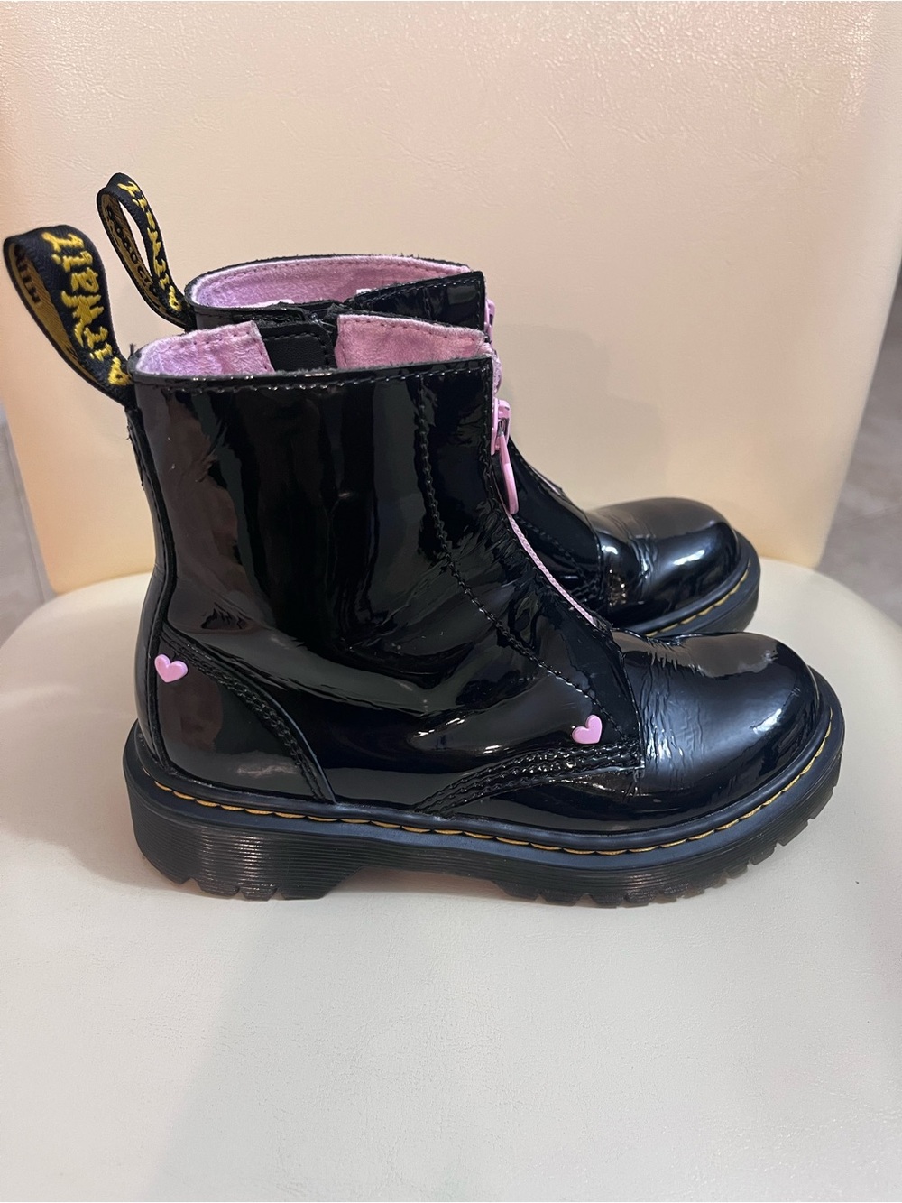 Kids Dr. Martens Black Patent Heart Accent Boots with Pink Lining
